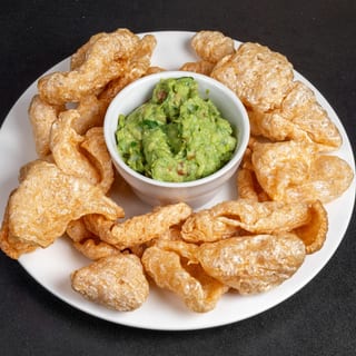pork skin and guacamole