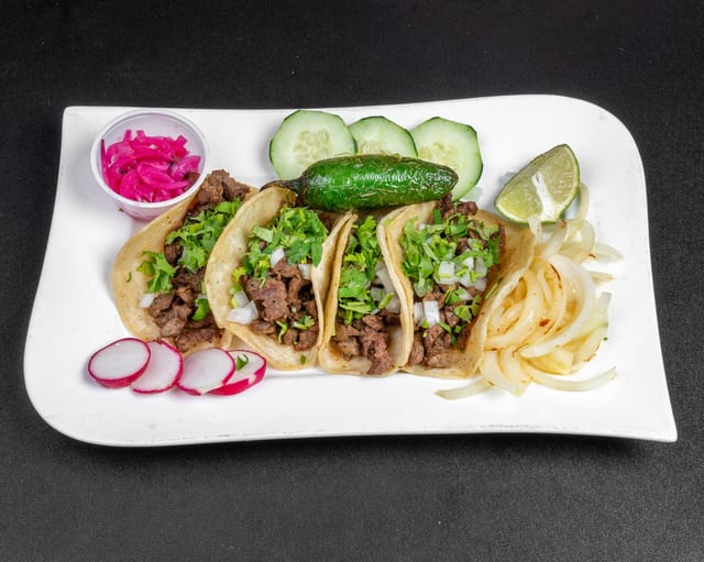 4 Tacos de Pastor.